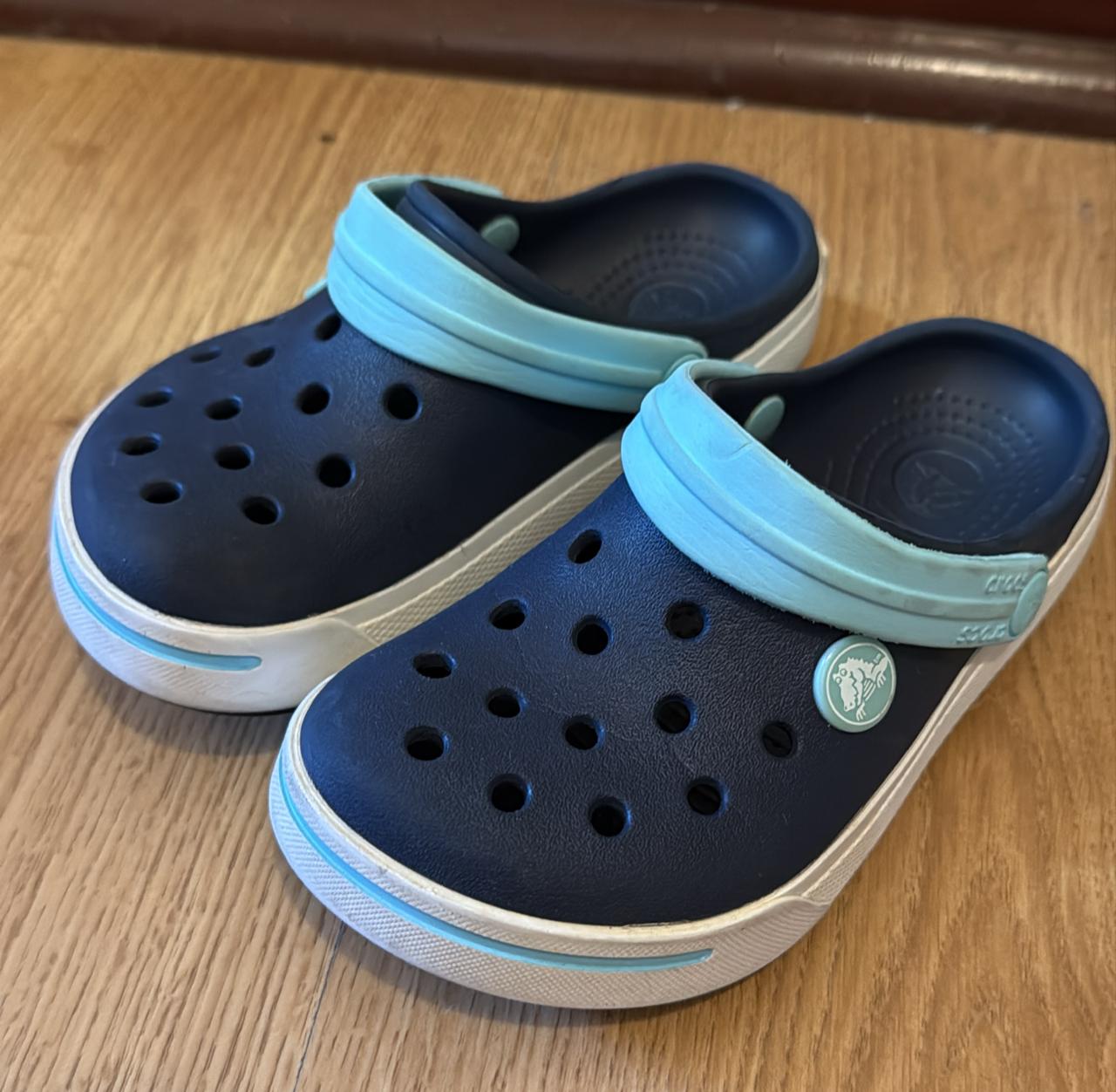 Crocs classic kids' clogs in navy, light blue, white